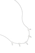 Ketting met wisselende hartjes en hangende steentjes