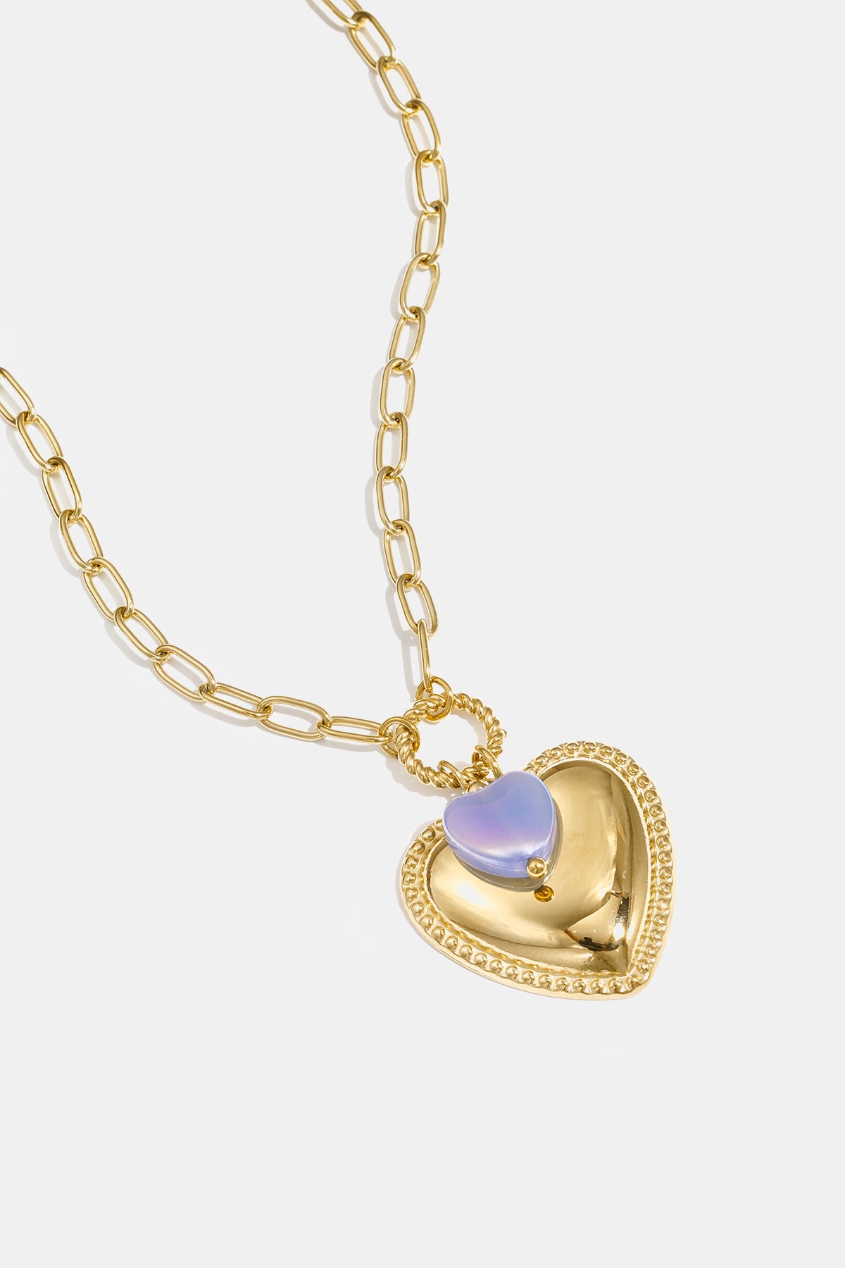 Goldkette mit herzförmigem Anhänger und Kristallperle