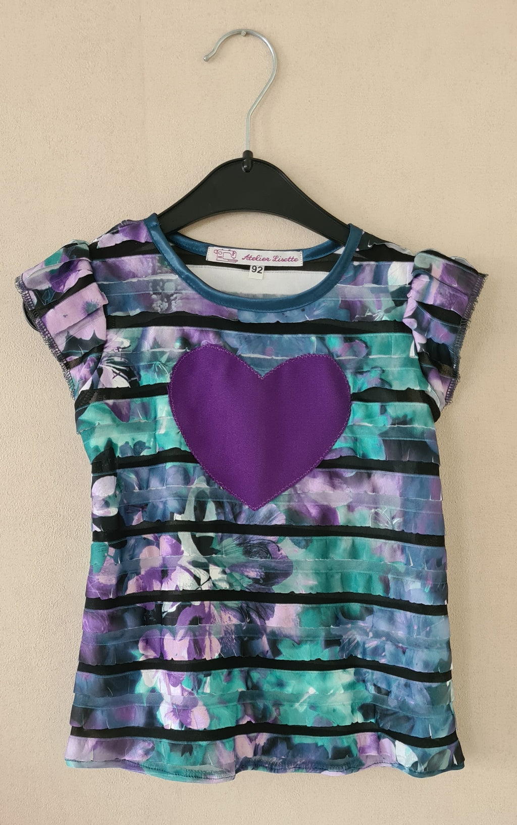 Striped girls' t-shirt with ruffles and heart appliqué | Purple | Size 92–116